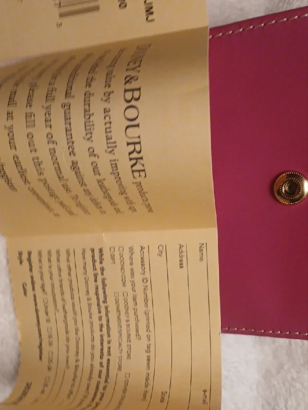 Dooney & Bourke Rose Pink Leather Compact Wallet with Gold Plaque